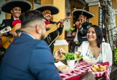 Couple celebrating with mariachi