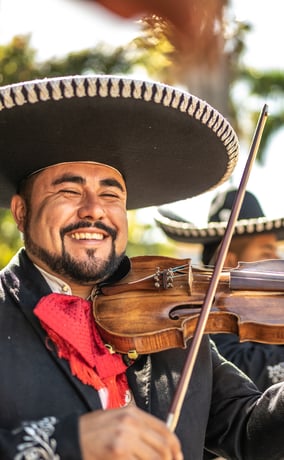 Mariachi performer playing the violin