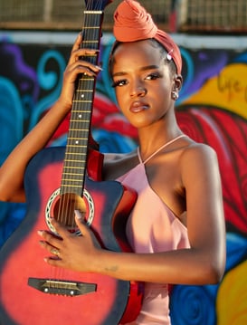 Woman playing guitar